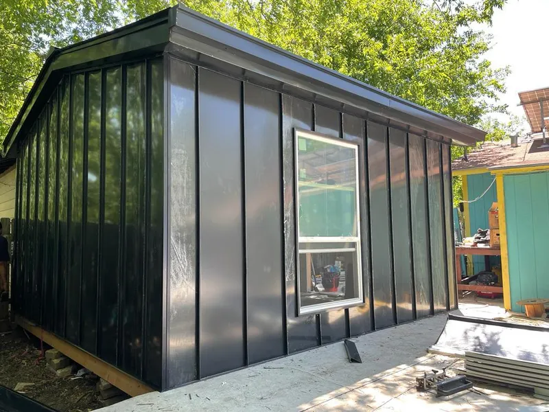 Black standing seam metal wall panels for Metal Roof Installation in North Reading