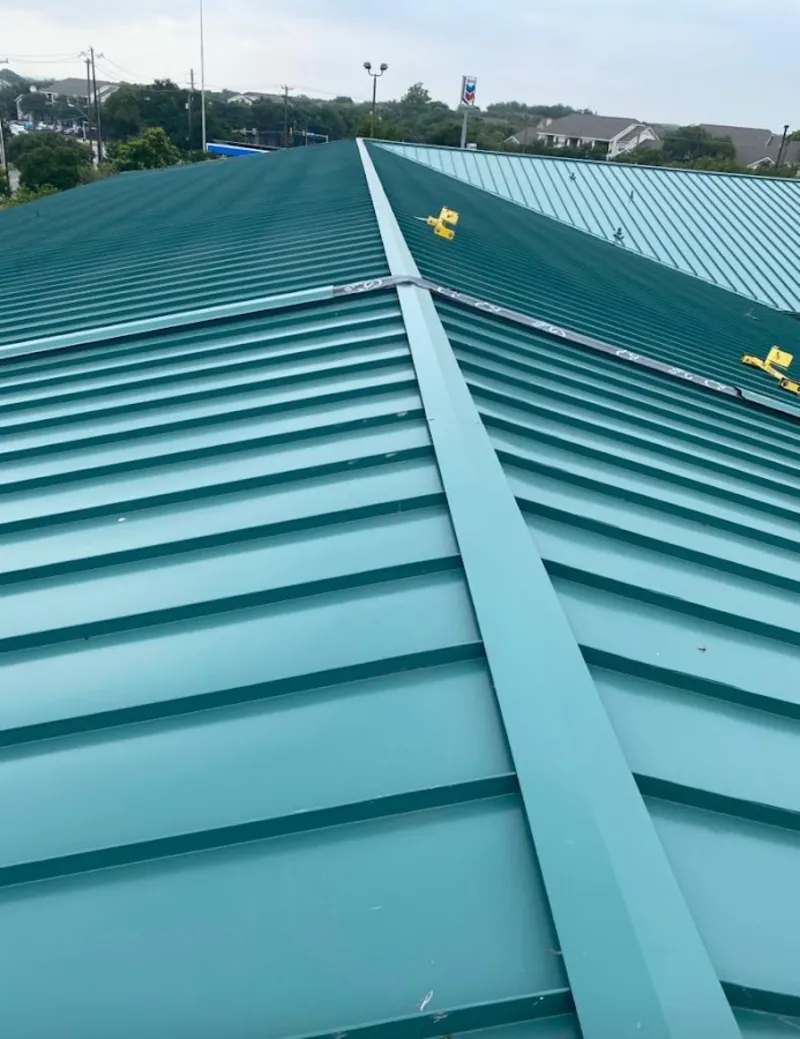 Green commercial metal roof ridge and valley for Metal Roof Repair in North Reading
